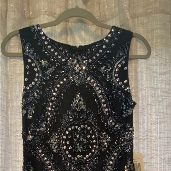 Black dress, full sequence. NEVER WORN WITH TAGS - Picture 1 of 5